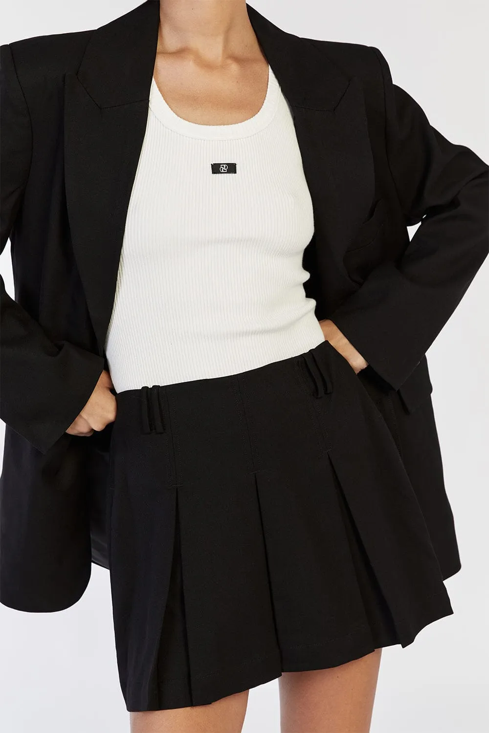 BRUNA BLACK PLEAT MINI SKIRT